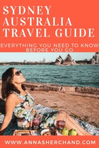 Sydney australia travel blog with a girl sitting in front of opera house